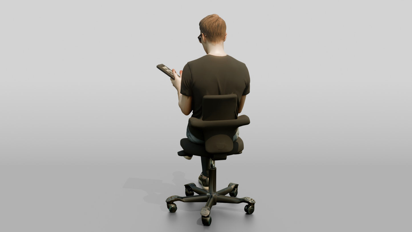 Man Seated with a Tablet and Glasses