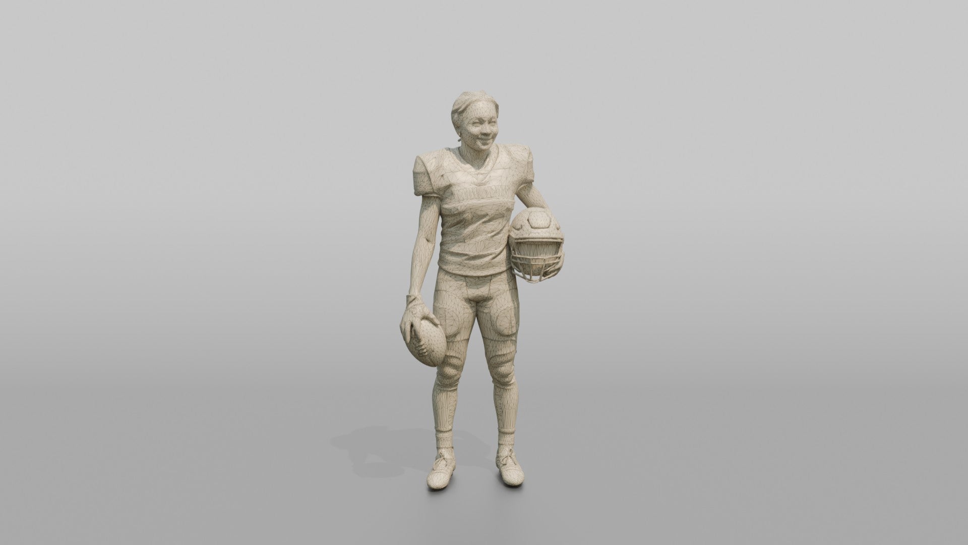 Wide Receiver Standing with the Ball at Her Side