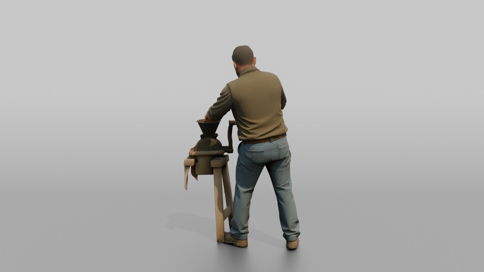 Farmer Operating Hand Cranked Corn Sheller