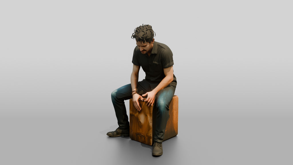 Cajon Player Sitting Atop Box Drum