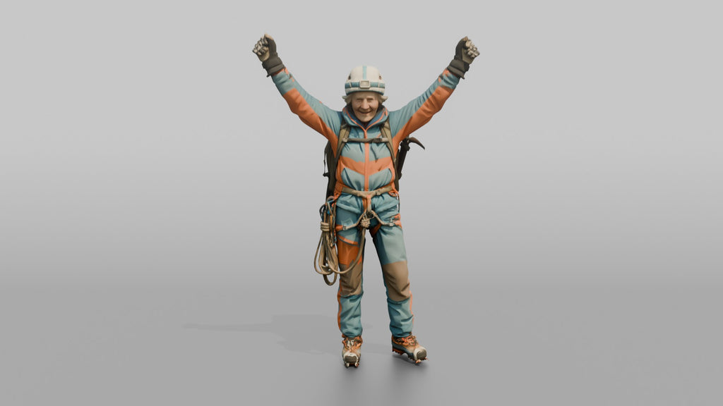 Mountaineer Raising Her Arms in Victory