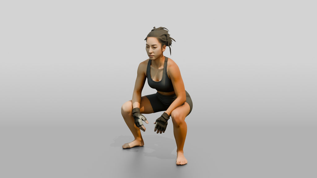 Woman Squatting with Fitness Gloves