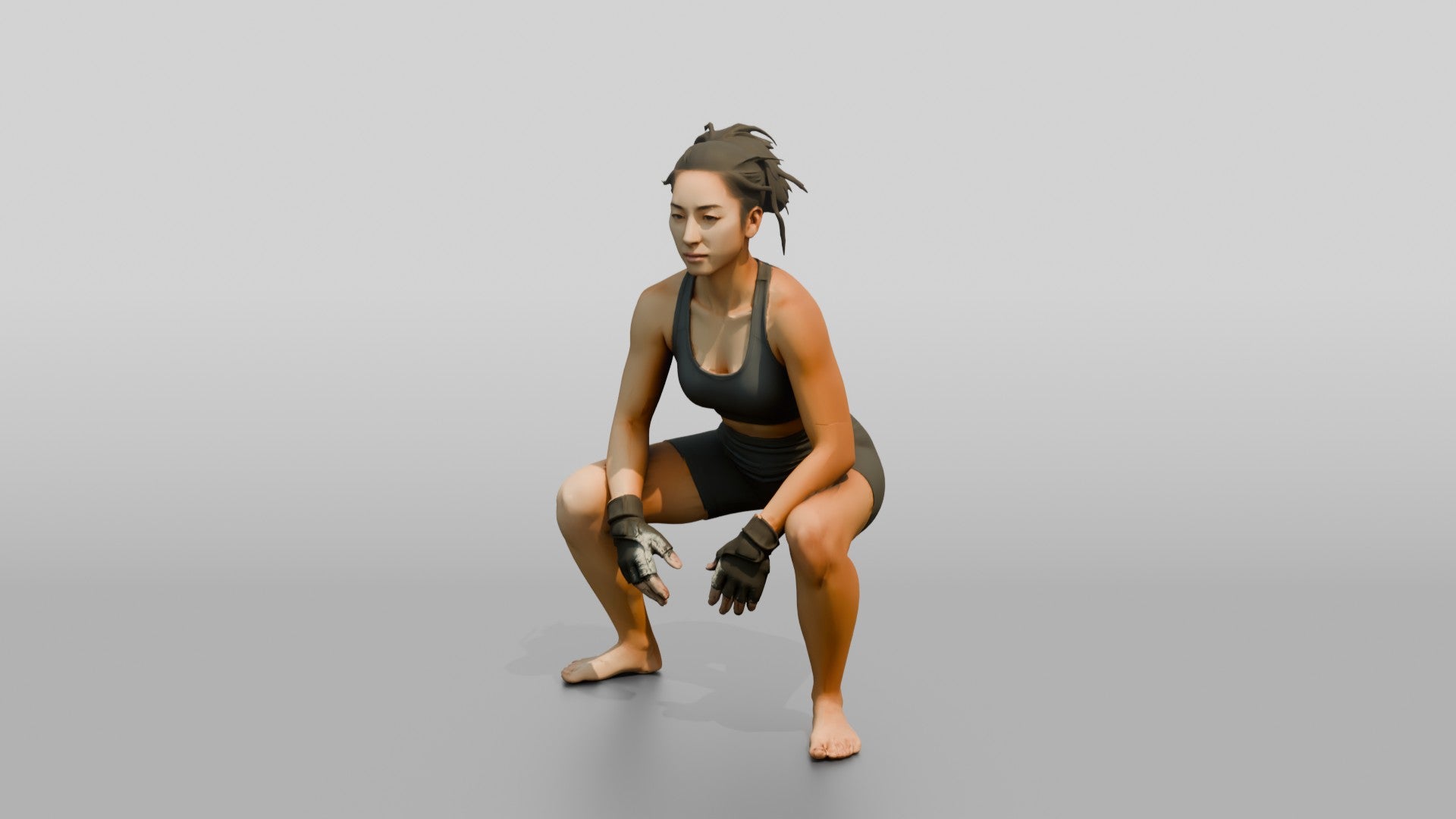 Woman Squatting with Fitness Gloves