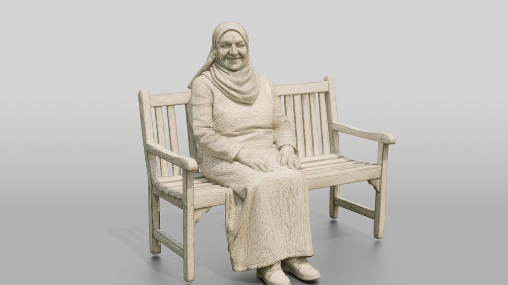 Elderly Iraqi Woman in Hijab Smiling on a Bench