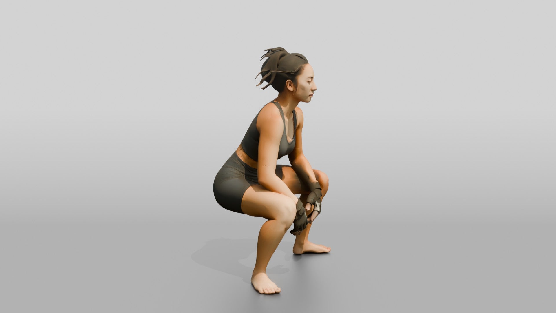 Woman Squatting with Fitness Gloves