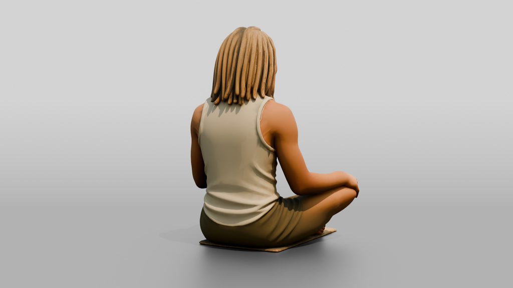 Man Meditating with Dreadlocks