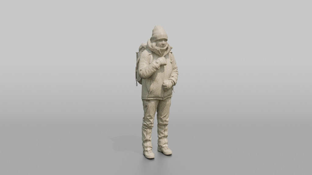 Winter Hiker Zipping Up Her Jacket