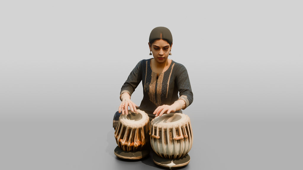 Tabla Player Seated with Twin Drums