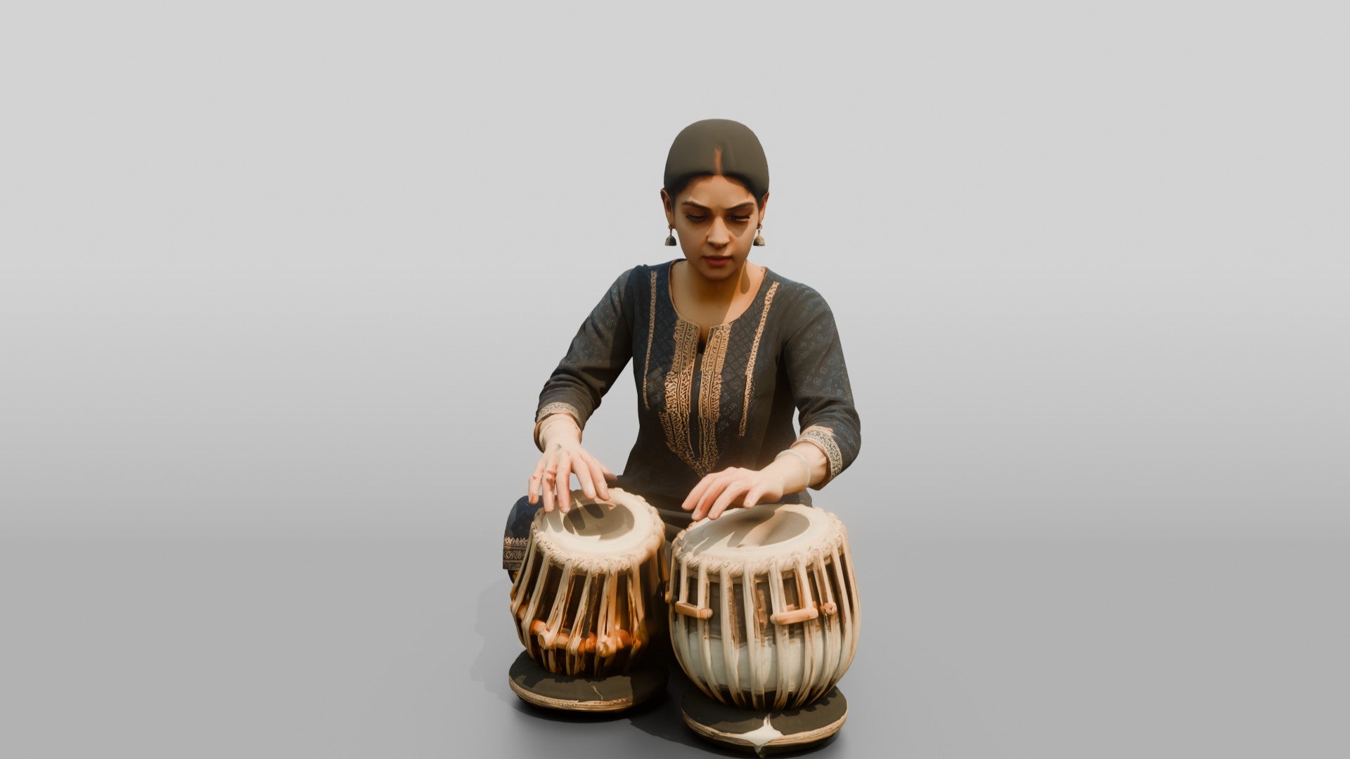 Tabla Player Seated with Twin Drums