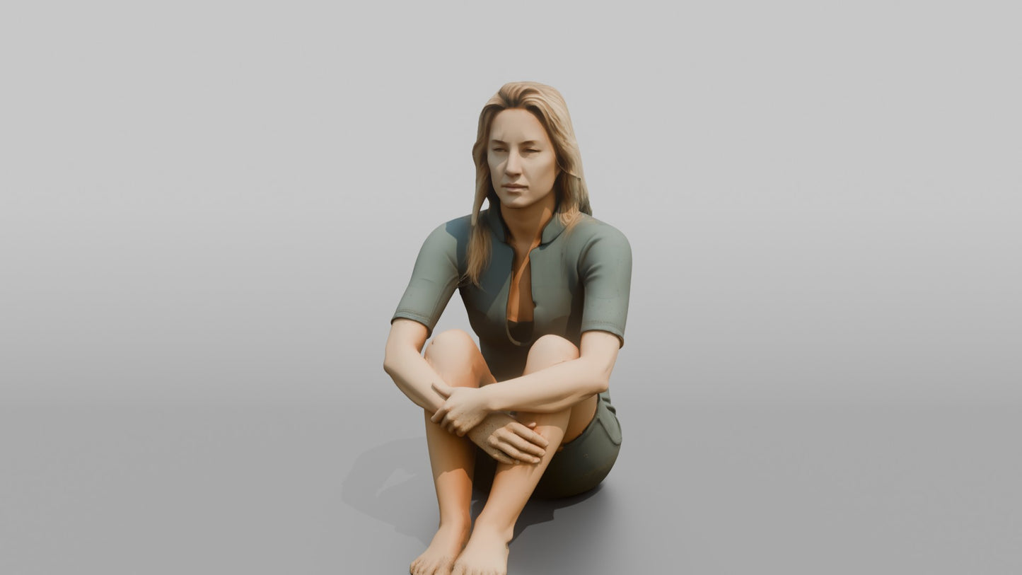 Surfer Sitting and Hugging Her Knees