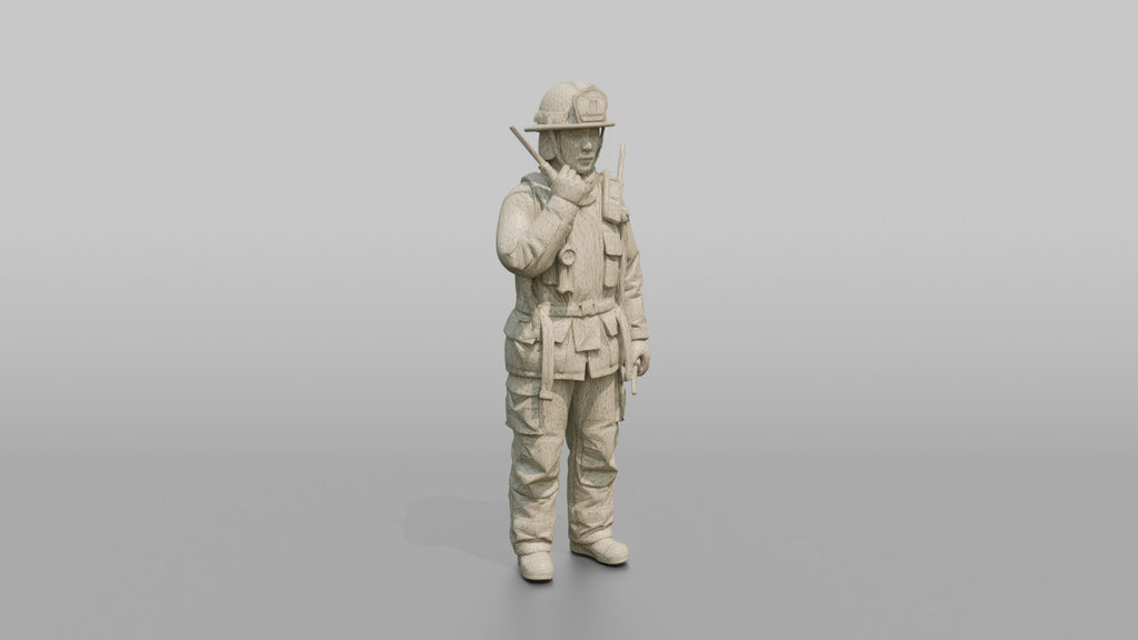 Firefighter Woman Speaking Into a Shoulder Walkie-talkie