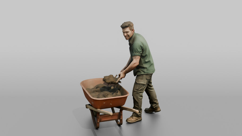 Farmer Shoveling Manure Into Wheelbarrow
