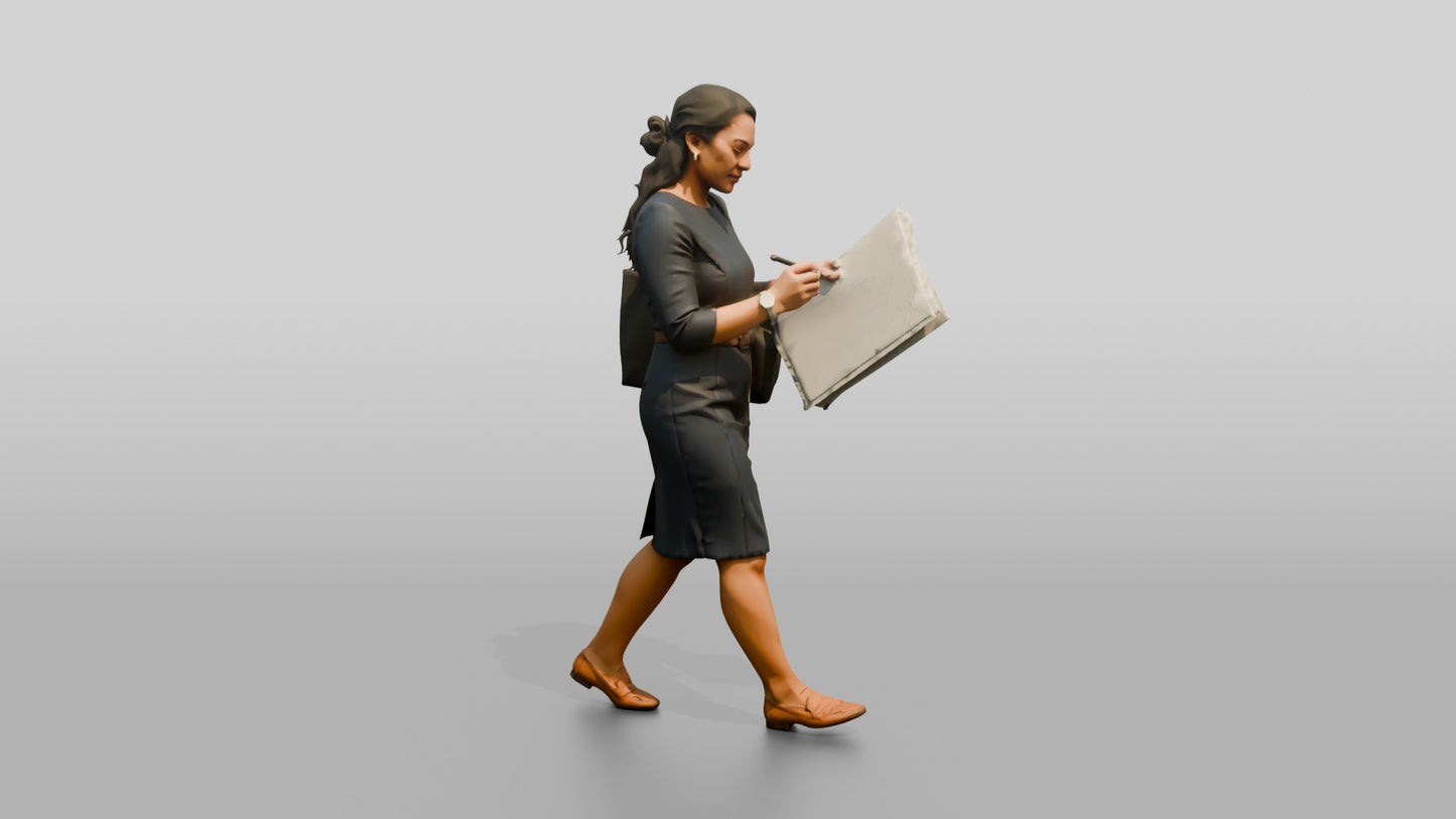 Businesswoman Walking with a Blueprint