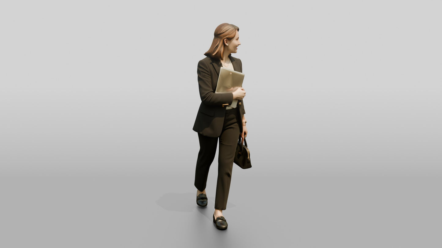 Woman Carrying a Laptop to a Meeting