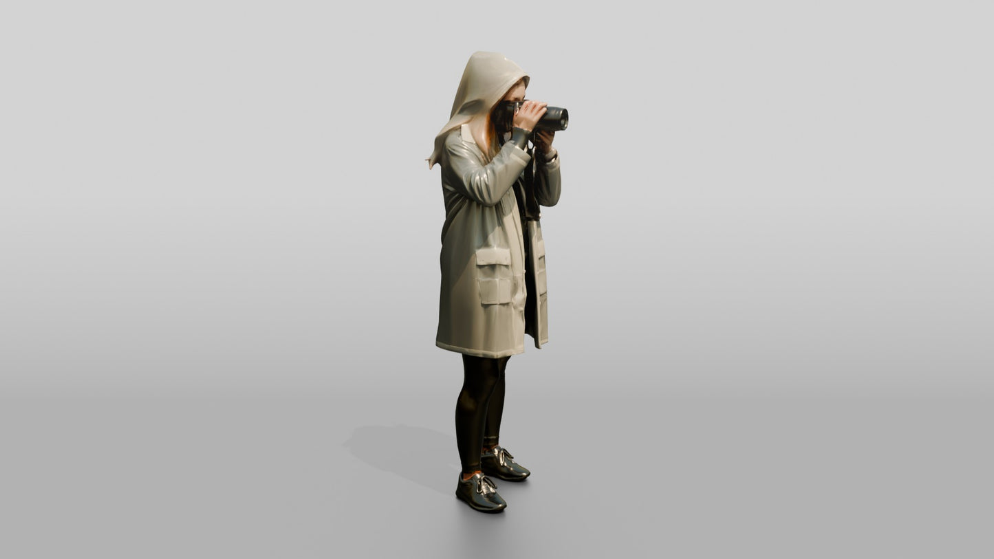 White Woman in Poncho Taking a Photo