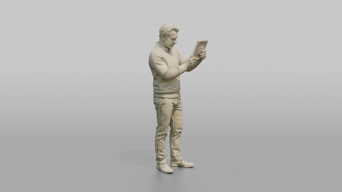 Man Customer Holding Up A Picture Frame To Inspect It Closely - wireframe topology preview
