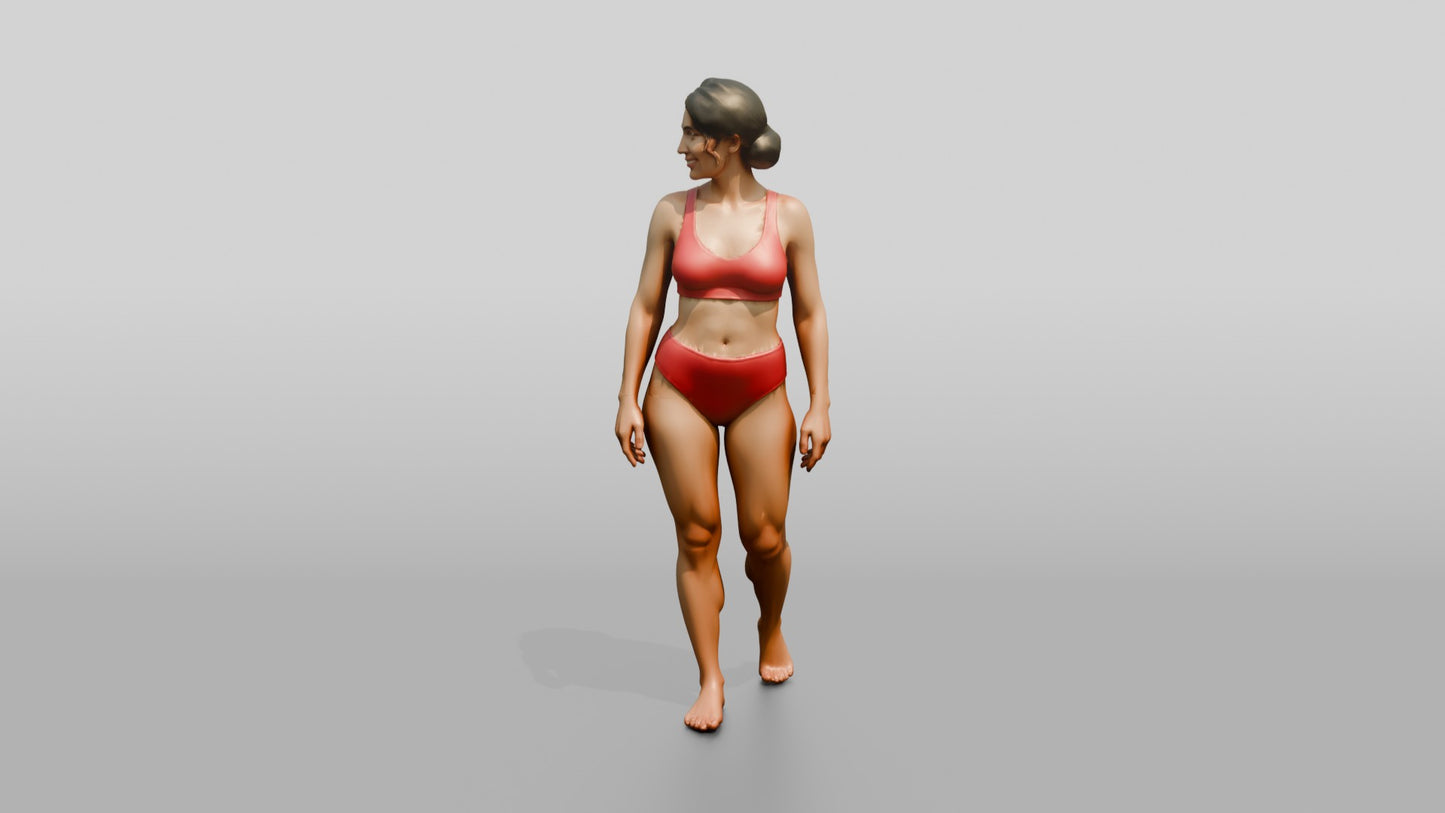 Woman in Red Two-Piece Swimsuit Walking