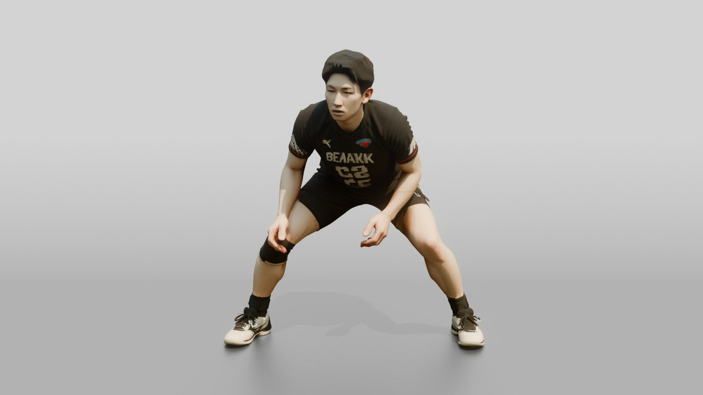 East Asian Male Volleyball Player in Black Libero Jersey