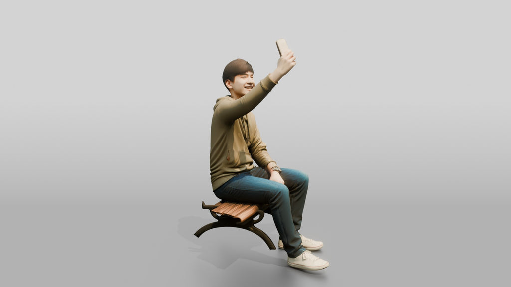 Young Chinese Man Taking a Selfie on a Bench