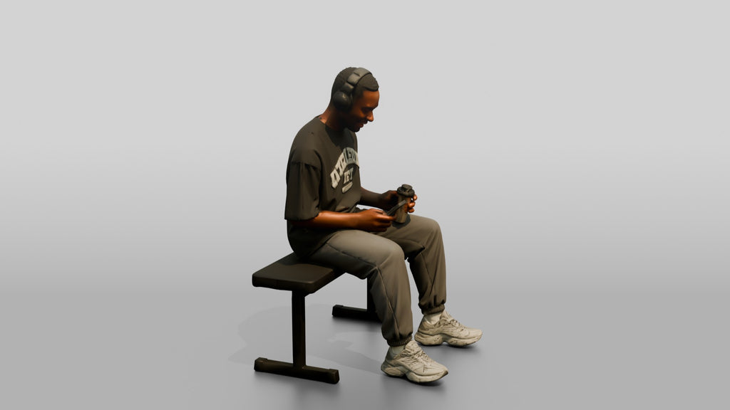 Man Sitting with Shaker and Headphones