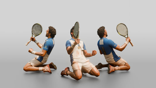 Male Tennis Player Sliding on His Knees in Celebration