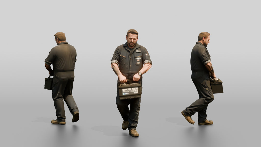 Mechanic Carrying a Car Battery