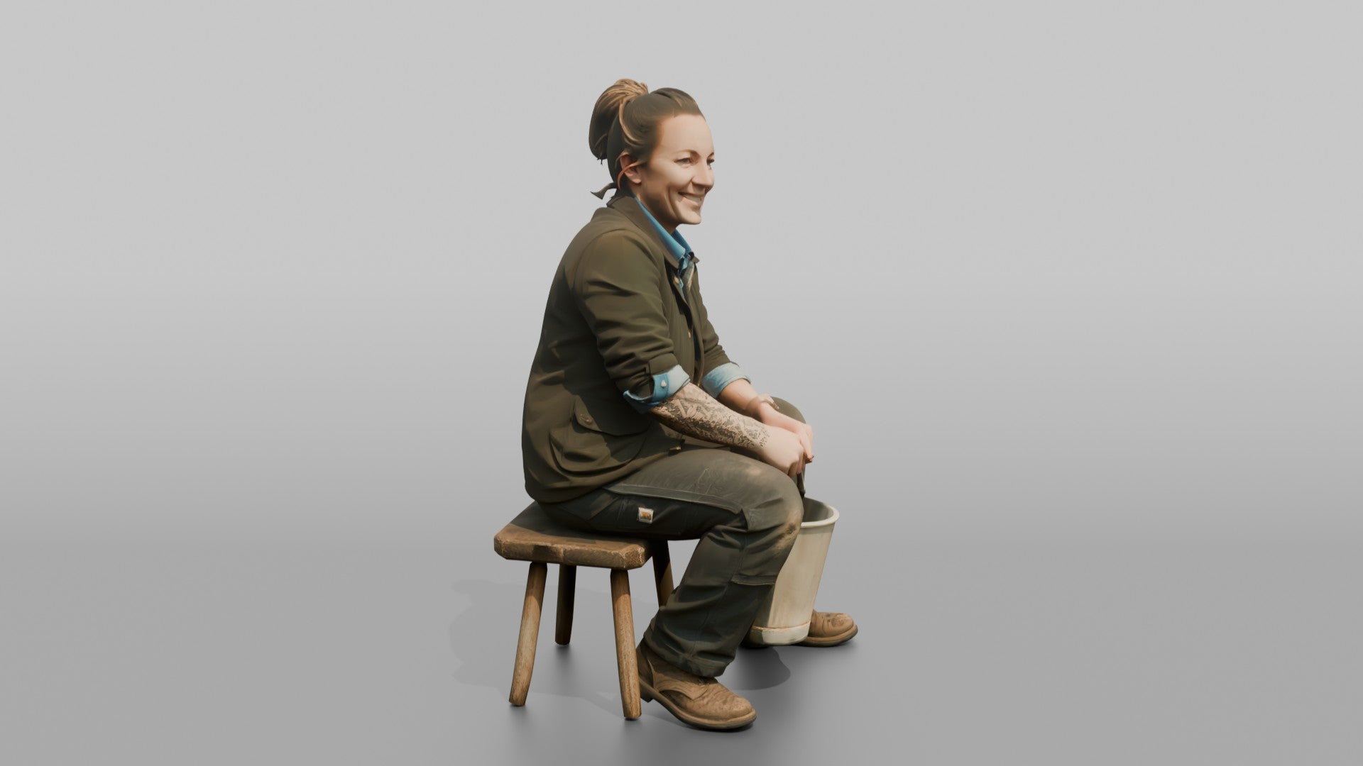Farmer Sitting On Stool In Milking Position