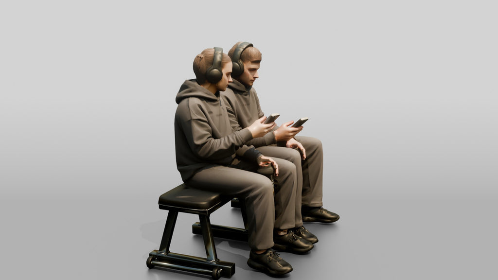 Two Men Sitting on Gym Bench