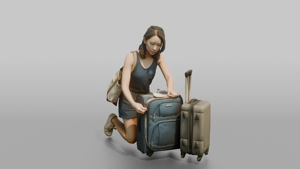 Traveler Kneeling To Zip Her Suitcase