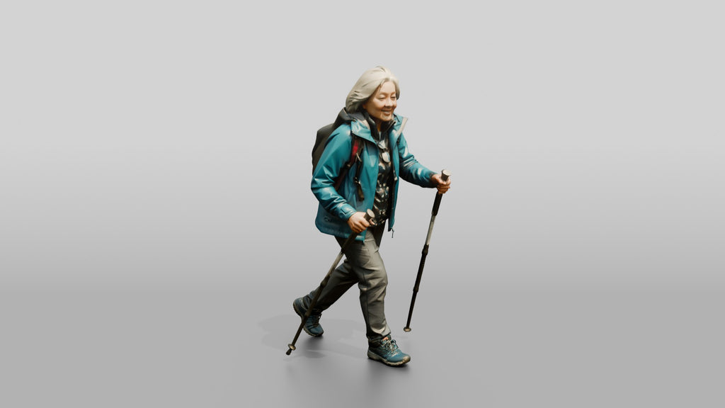 Elderly Chinese Woman Hiking with Trekking Poles