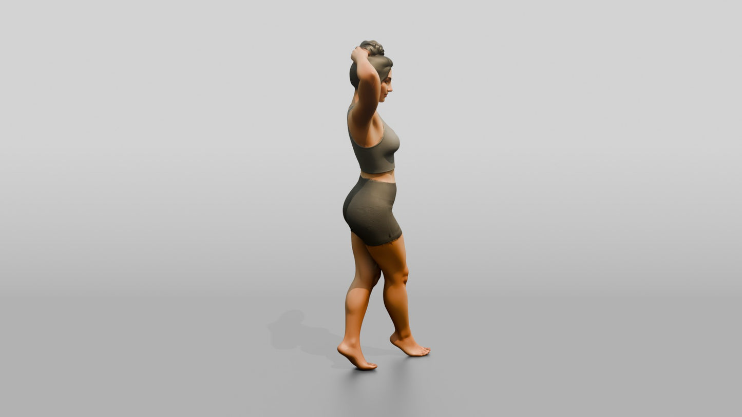 Woman in Olive Activewear with Hands in Her Hair