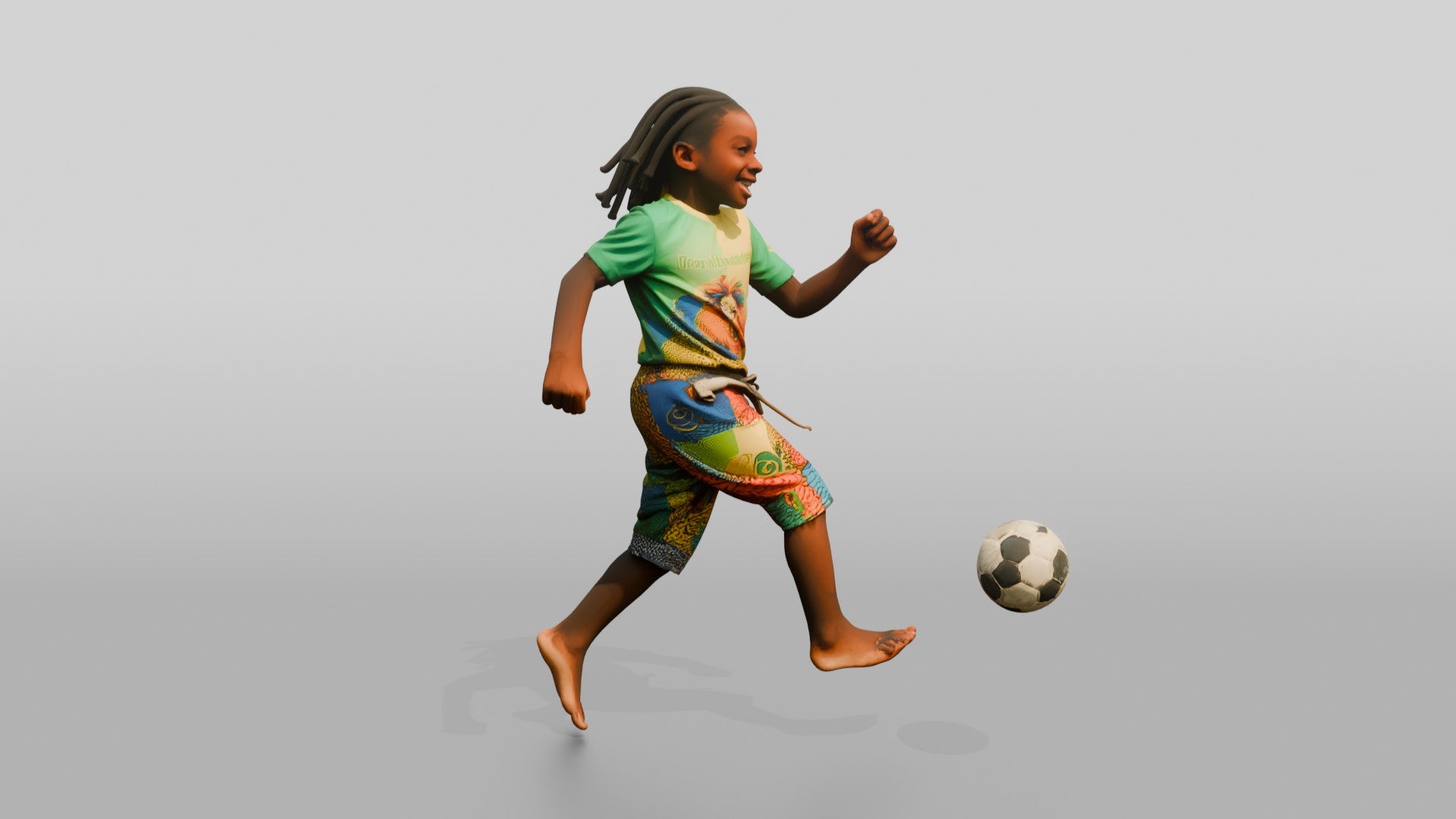 African Boy Playing Soccer in Patchwork Shorts