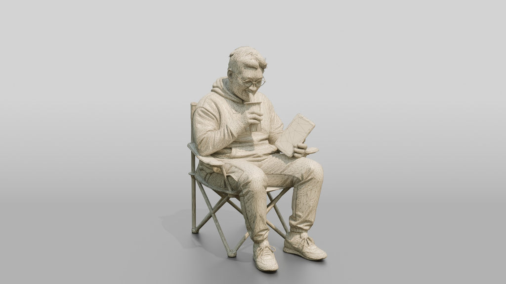 Chinese Man Relaxing with Bubble Tea and Tablet