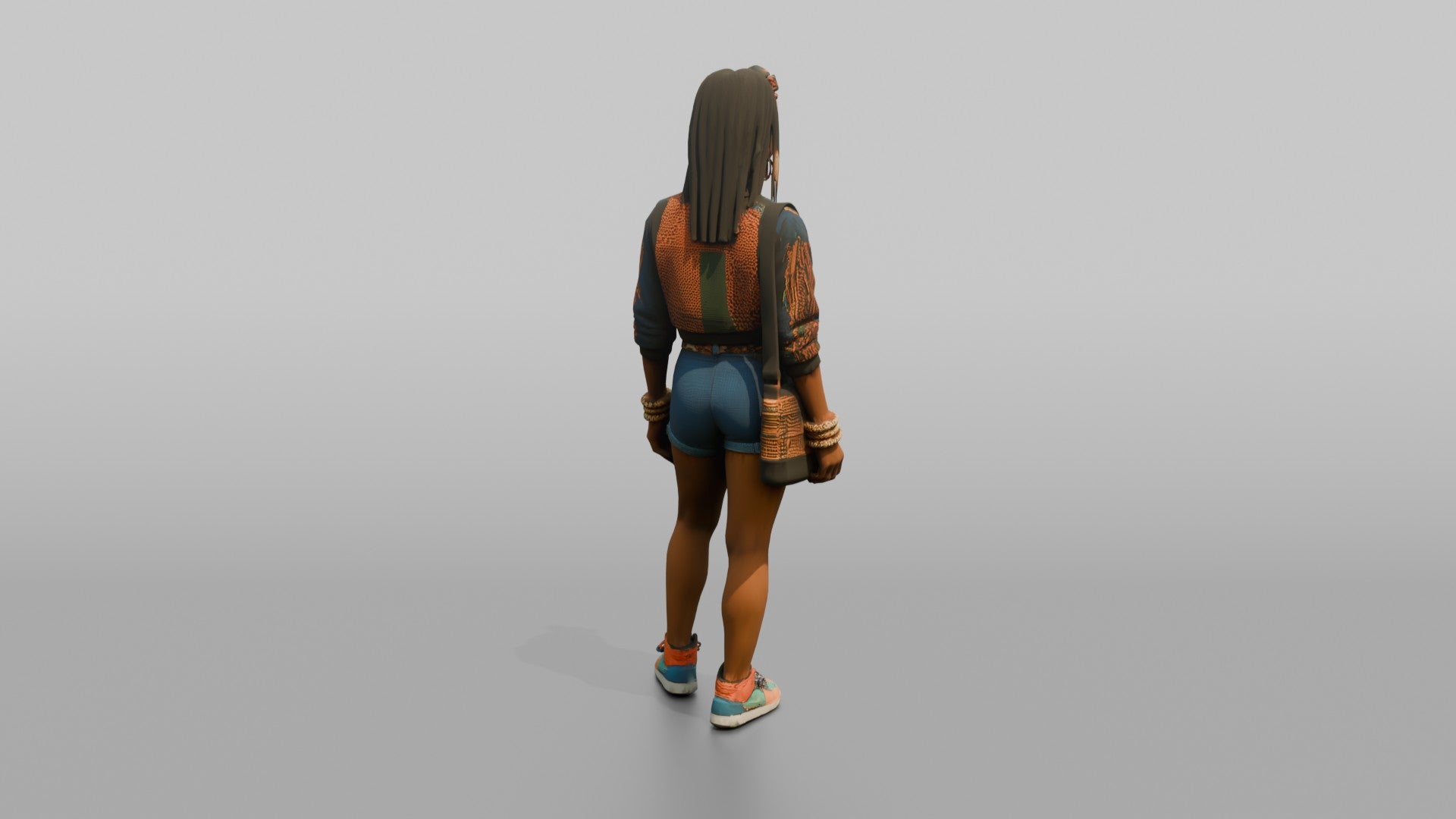 African Woman in Print Crop Sweater and Denim Shorts