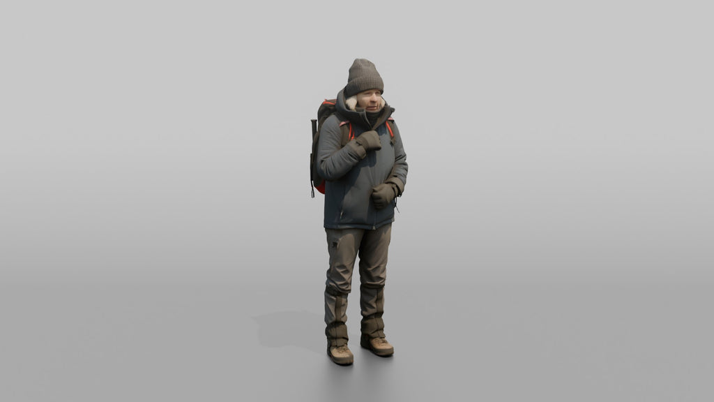 Winter Hiker Zipping Up Her Jacket