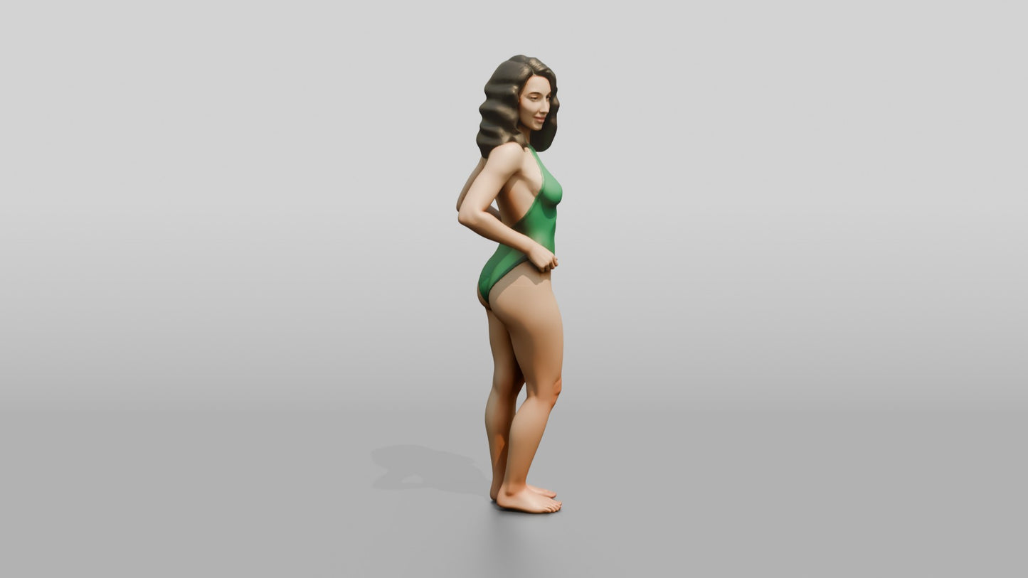 Woman in Green One-Piece Swimsuit with Hand on Hip