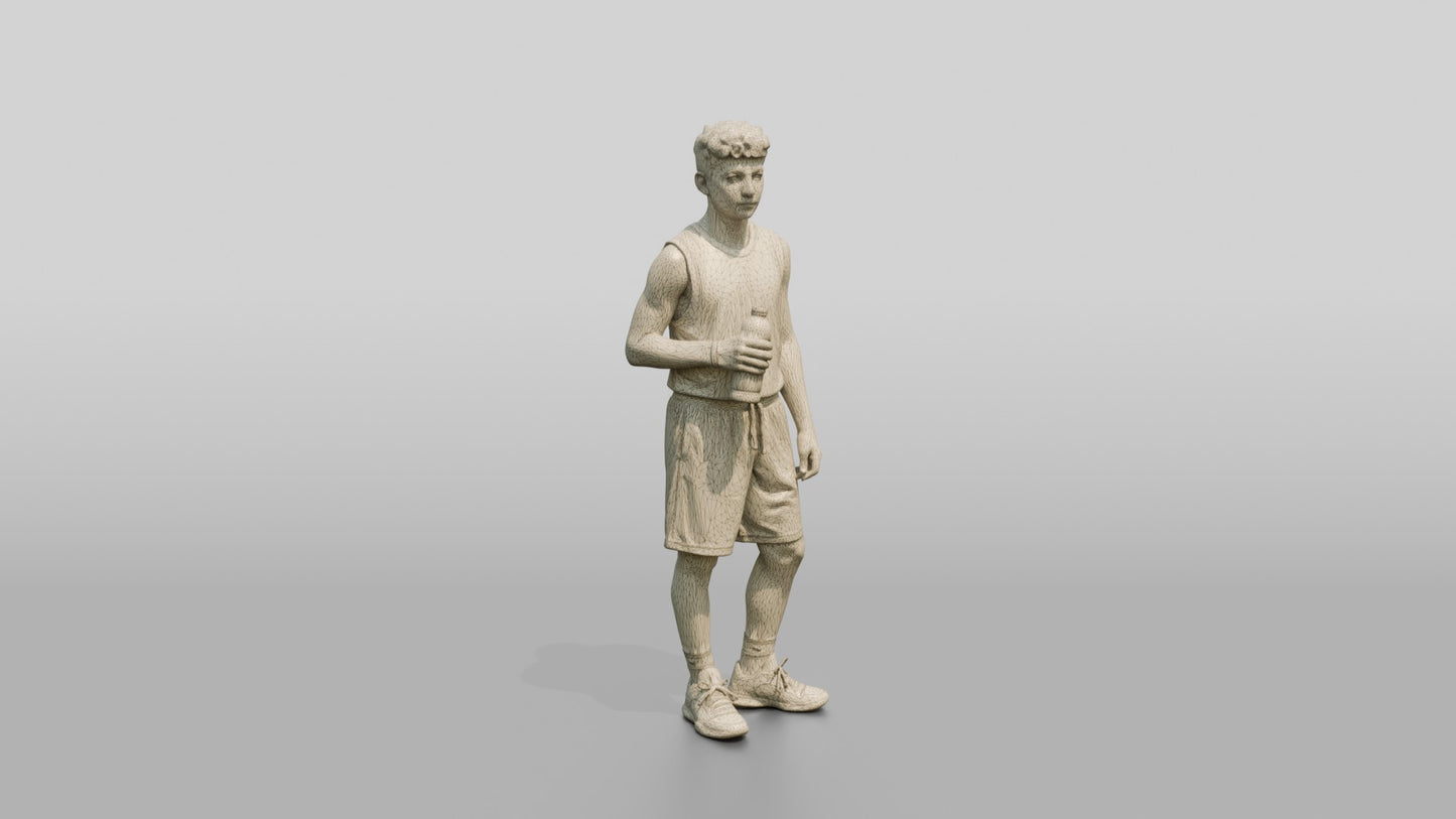 Slender Greek Teenage Boy Holding a Sports Drink