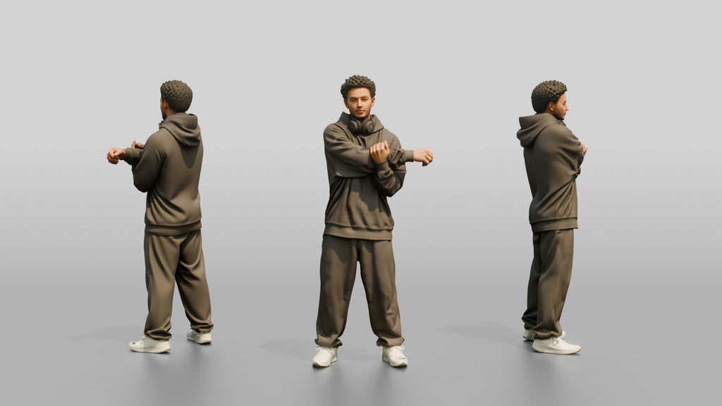 Man Stretching Arms in Oversized Hoodie