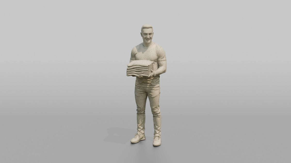 Man Customer Holding A Stack Of Folded T-shirts - wireframe topology preview