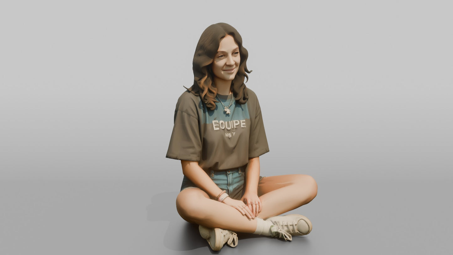 Teenage Girl Sitting Cross-Legged in Streetwear