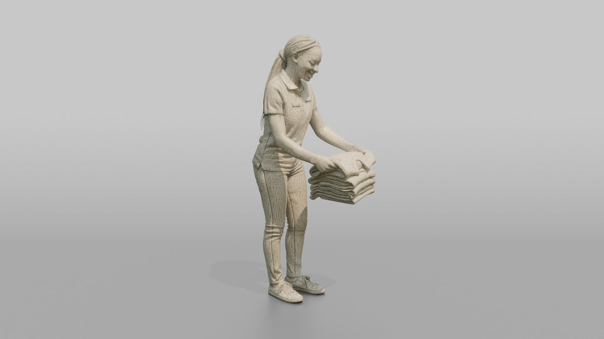 Woman Sales Associate Folding A Stack Of Sweaters - wireframe topology preview