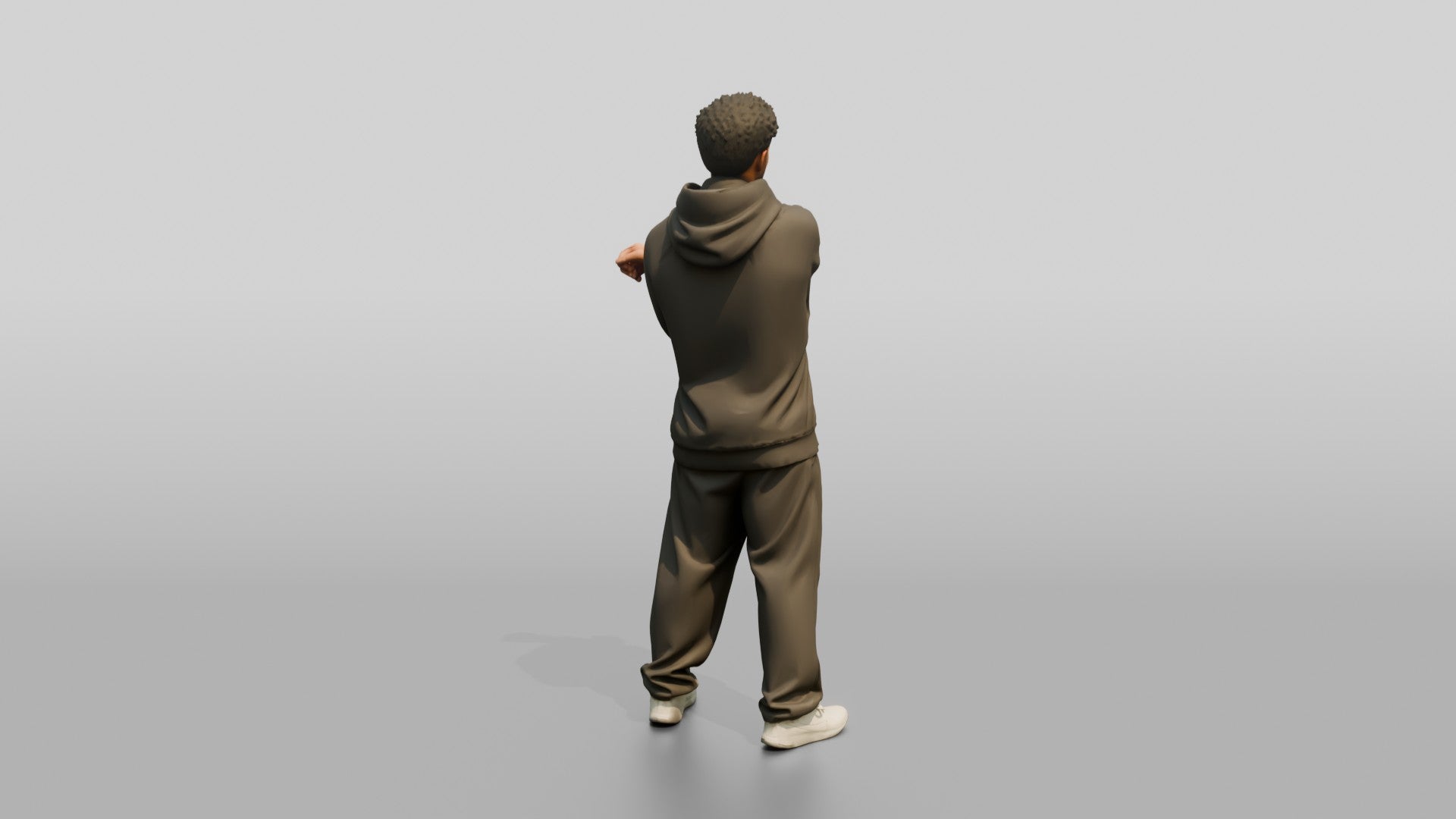 Man Stretching Arms in Oversized Hoodie