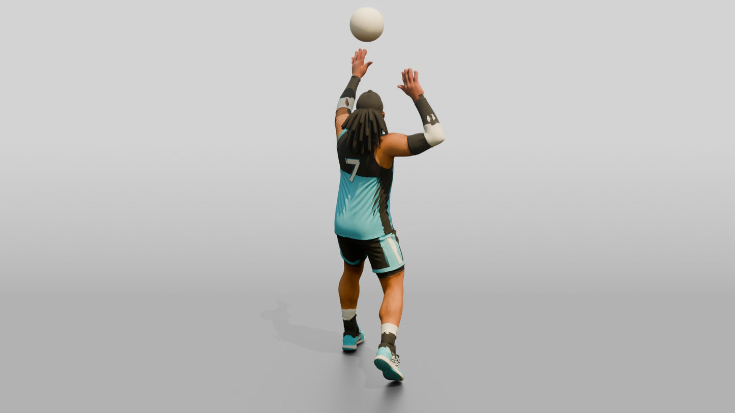 Male Volleyball Player in Cyan and Black Kit