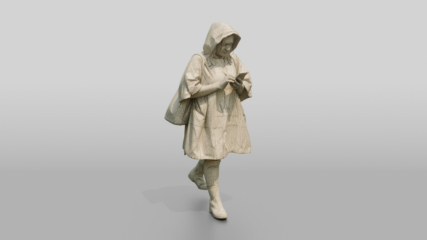 Indian Woman in Blue Poncho Checking Phone