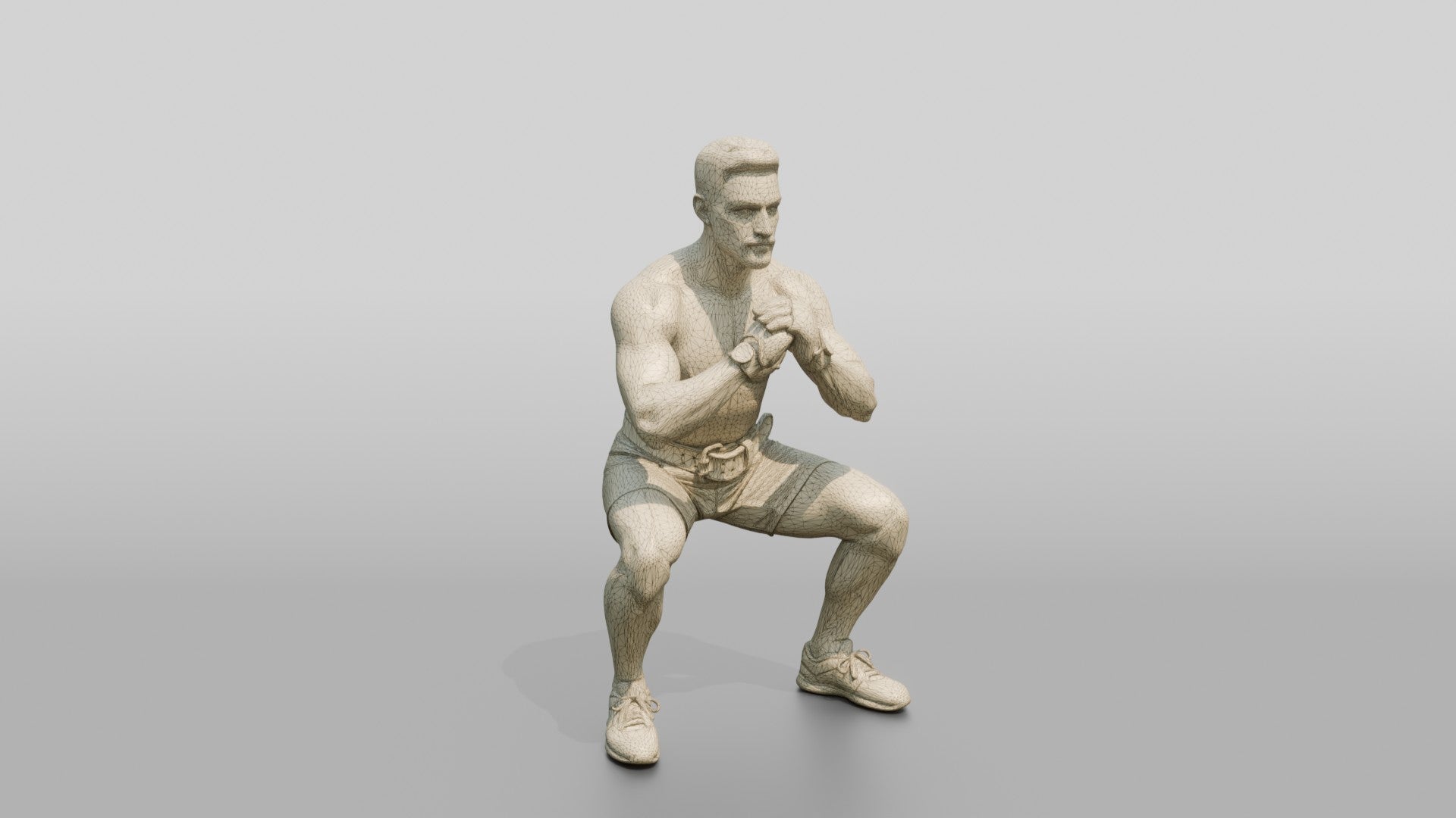 Man Squatting with Fitness Gloves