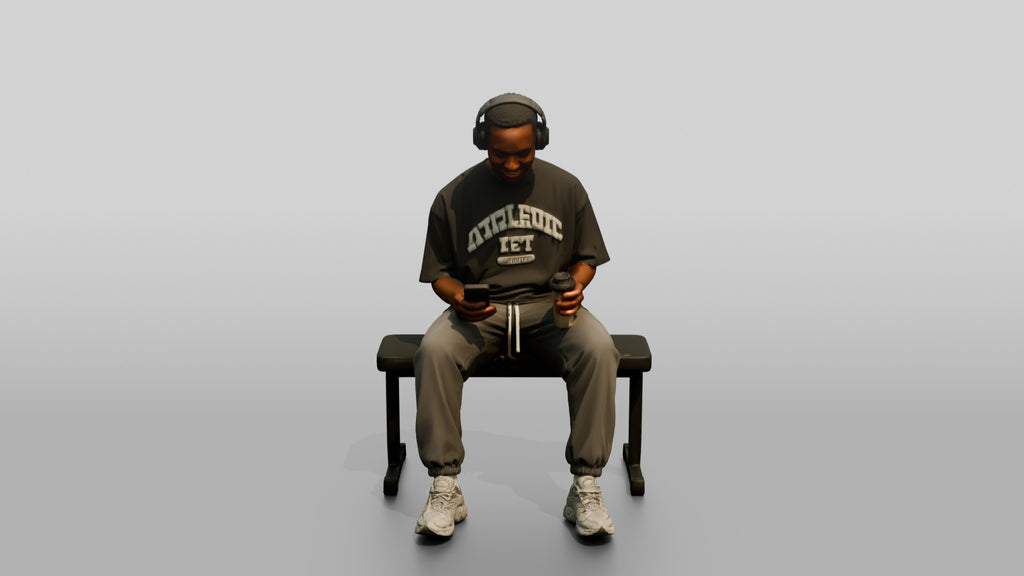 Man Sitting with Shaker and Headphones
