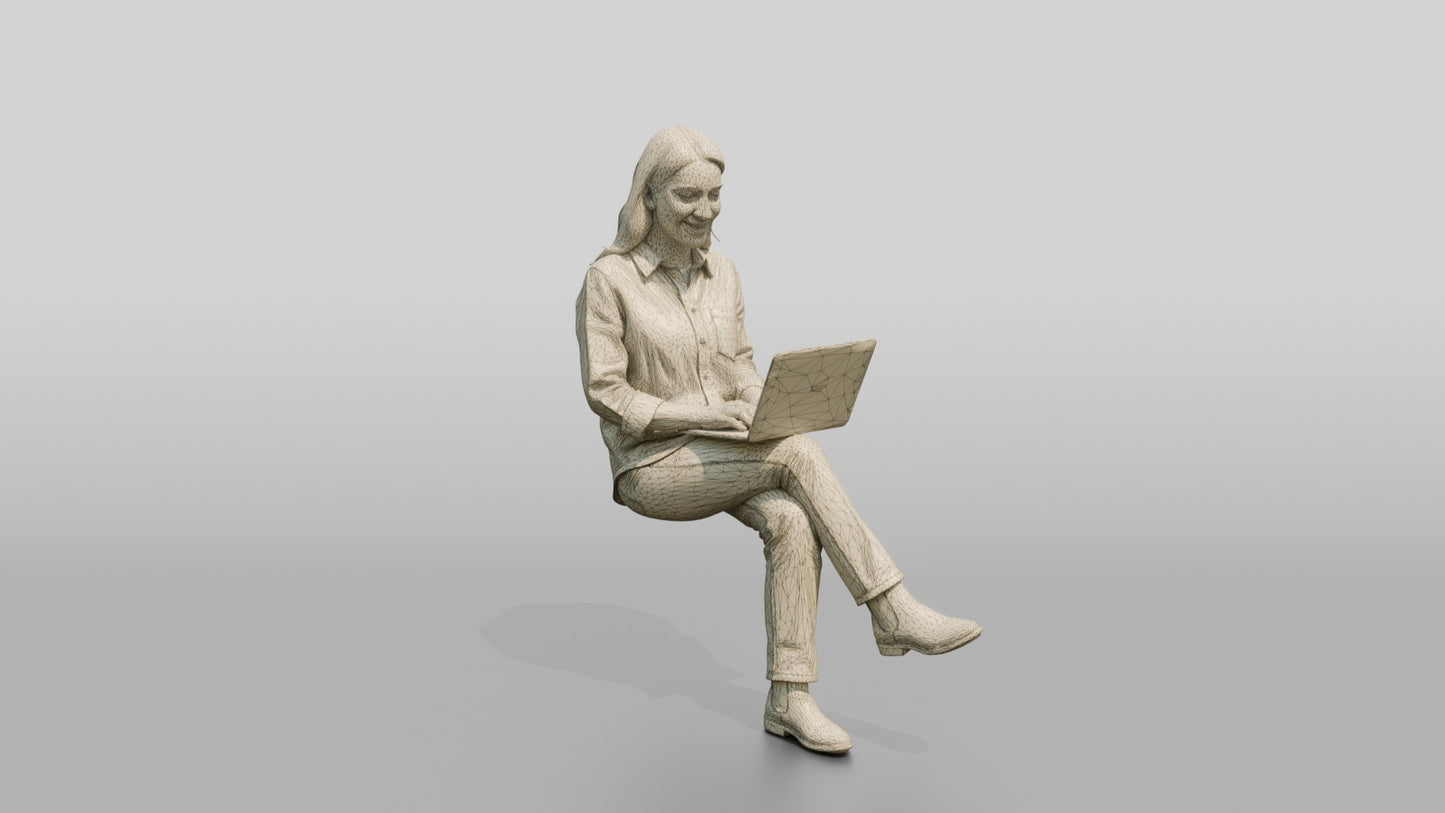 Woman Typing on Laptop with Tea