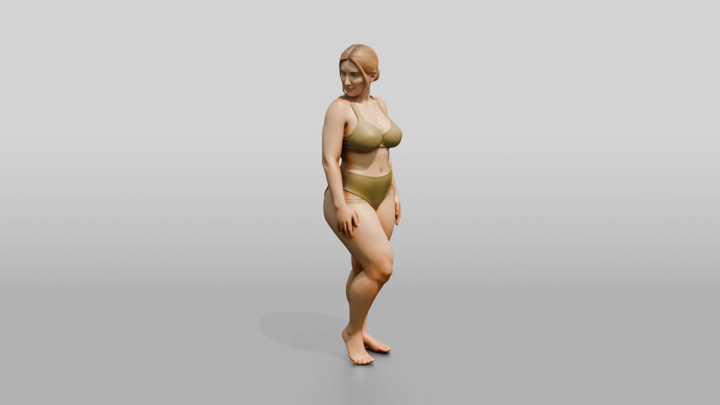 Curvy Woman in Olive Two-Piece Swimsuit Standing