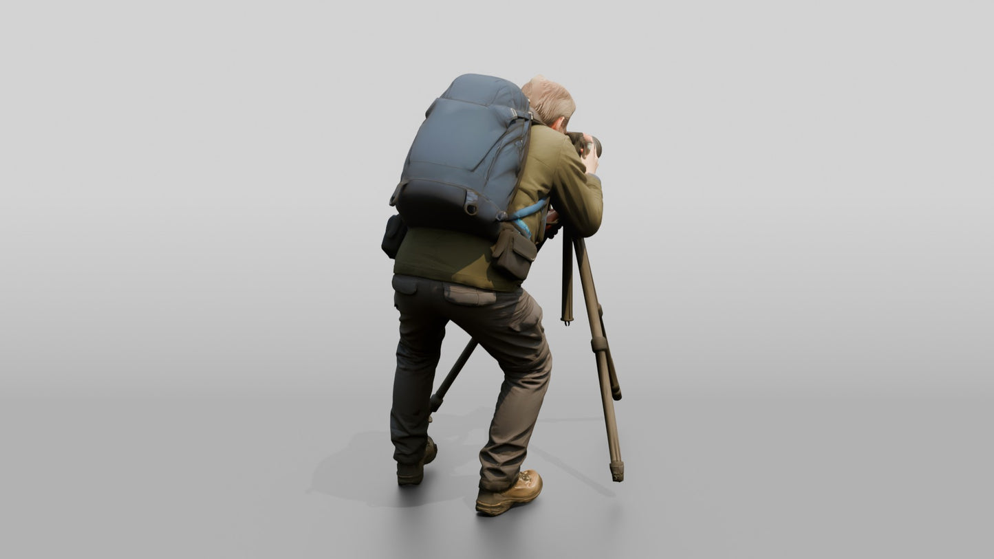 Man Setting Up Camera Tripod