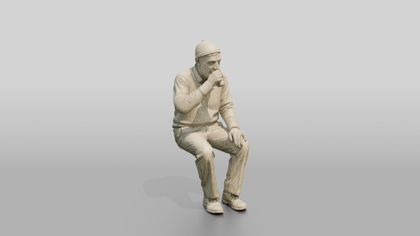 Man Sipping Traditional Tea
